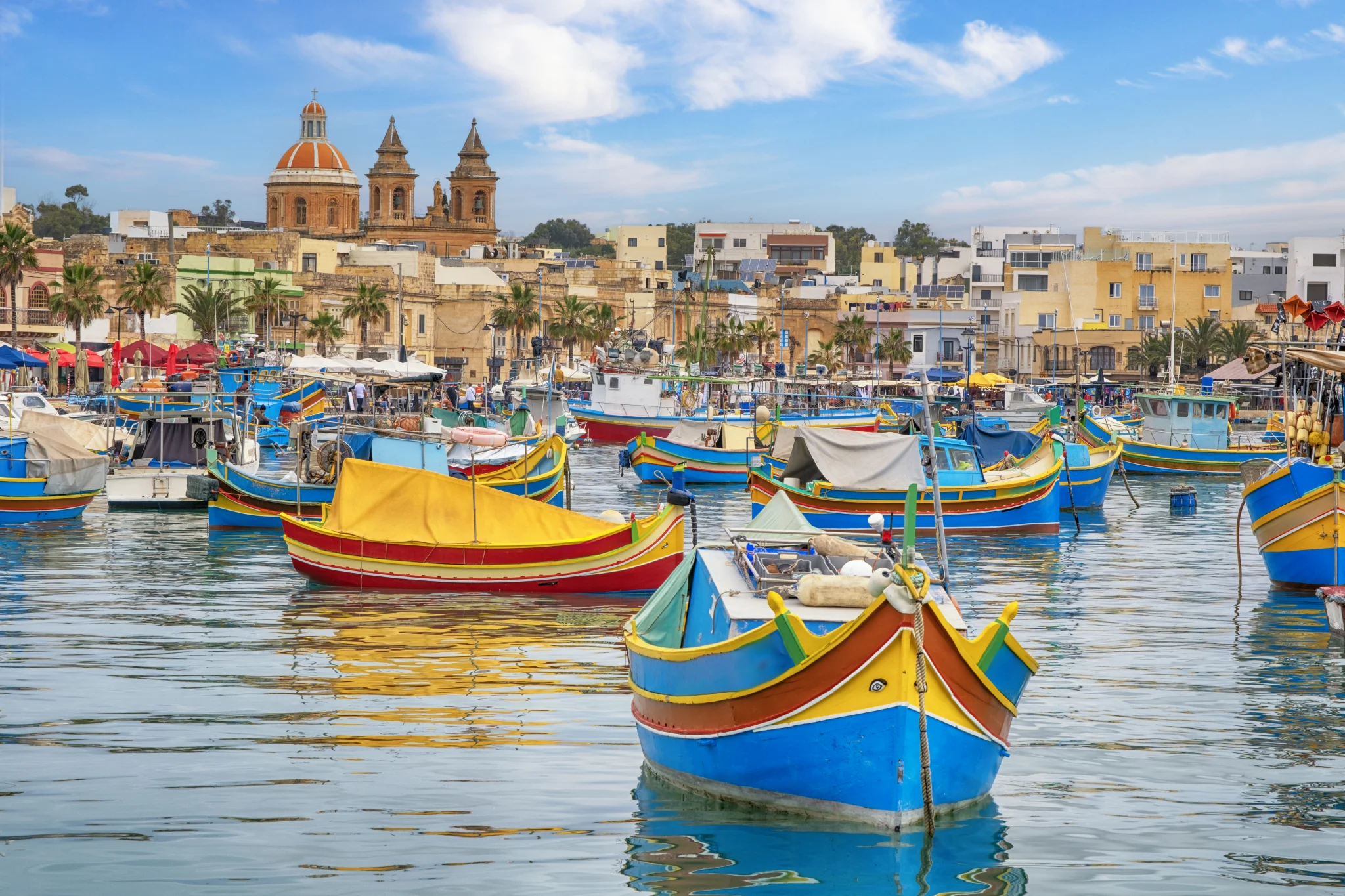 CBI Colorful fishing boats in Marsaxlokk, Malta. 
